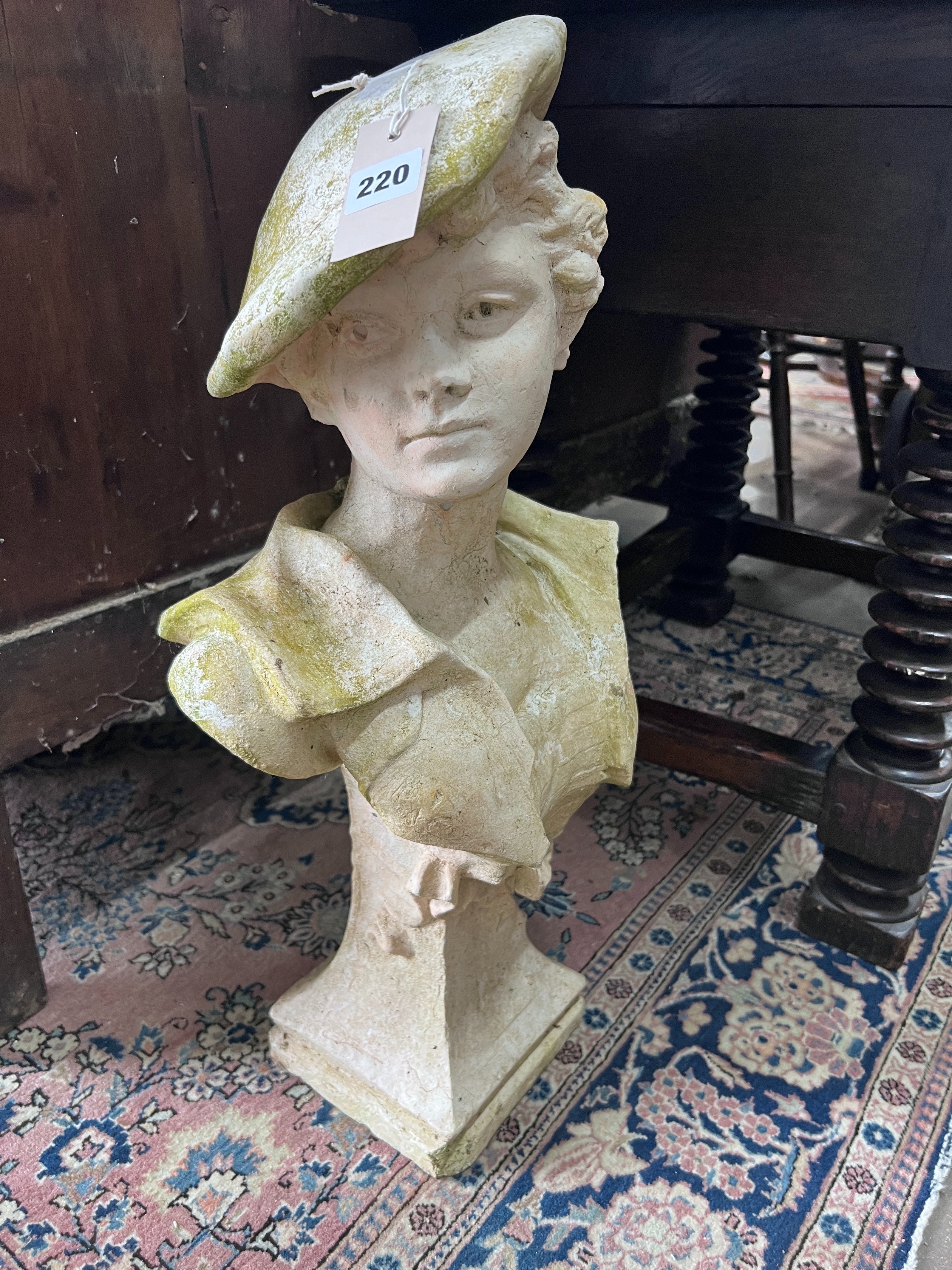 A reconstituted stone bust of a 17th century youth, height 60cm *Please note the sale commences at 9am.